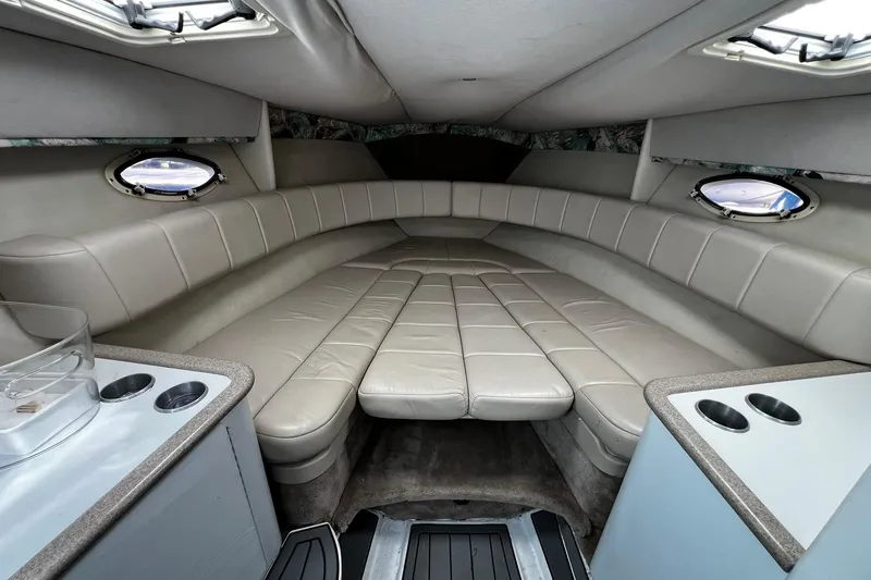Slide: The Image of Interior view of a 1997 Formula 330 Sun Sport boat, featuring sleek design and modern amenities. - 22