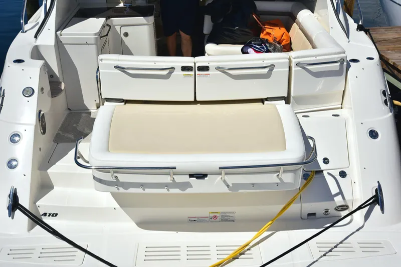 Slide: The Image of 2013 Sea Ray 410 Sundancer yacht with spacious seating and sleek design. - 18