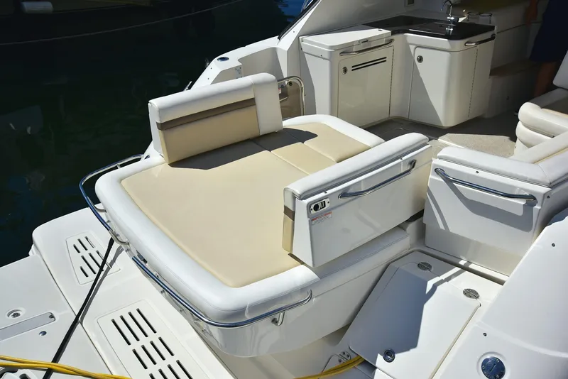 Slide: The Image of 2013 Sea Ray 410 Sundancer yacht with luxurious seating and sleek design. - 20