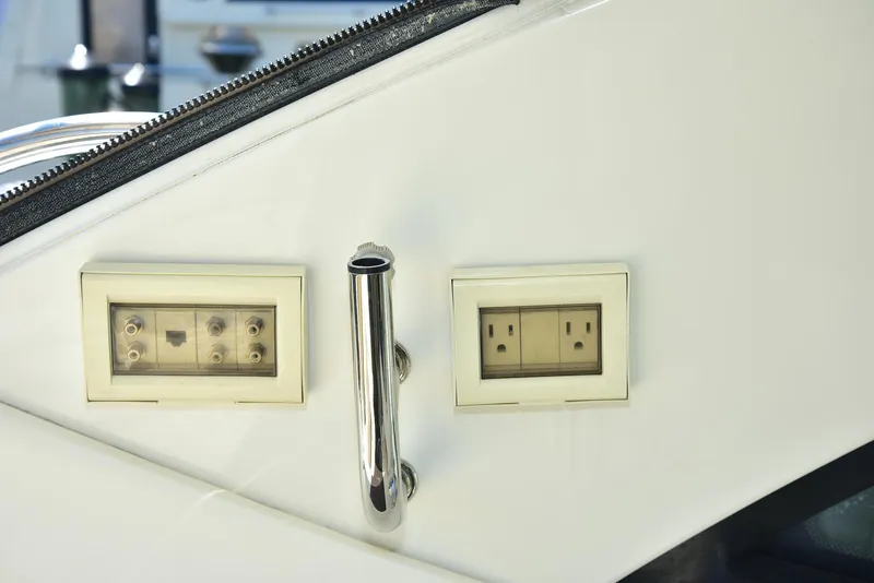 Slide: The Image of Power outlets on 2013 Sea Ray 410 Sundancer yacht interior. - 32