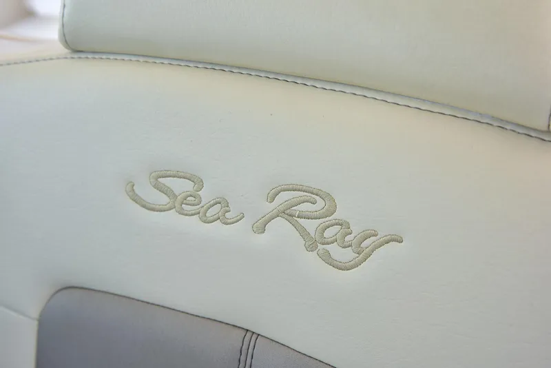 Slide: The Image of Embossed Sea Ray logo on 2013 Sea Ray 410 Sundancer boat seat. - 40