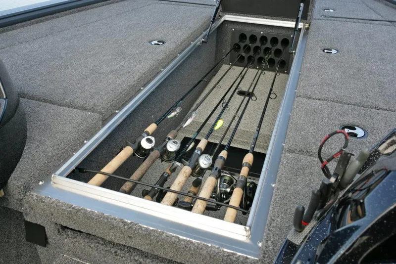 Slide: The Image of Manufacturer Provided Image: 2021 Lund 2075 Pro-V Bass boat with fishing rod storage compartment. - 18