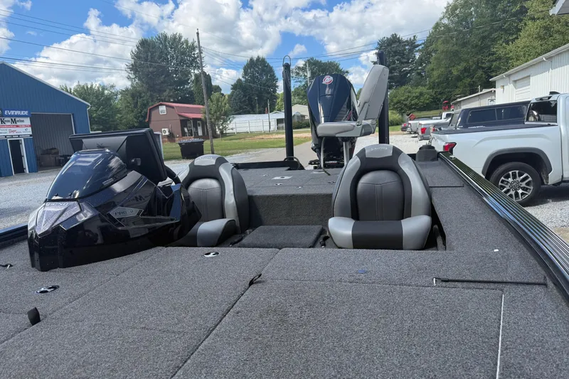 Slide: The Image of 2021 Lund 2075 Pro-V Bass boat with sleek seating and modern design. - 7