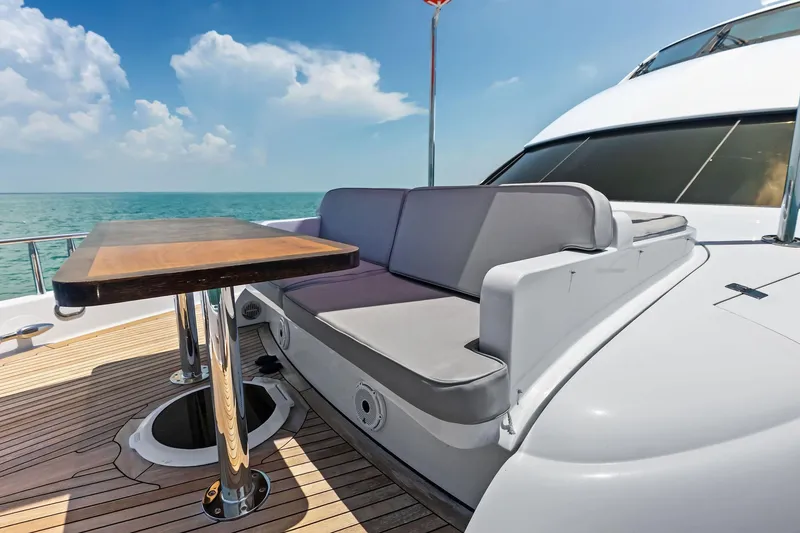 Slide: The Image of Luxury 2006 Lazzara Skylounge yacht deck with seating and table, ocean view. - 11