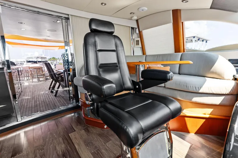 Slide: The Image of Luxurious interior of 2006 Lazzara Skylounge yacht with leather seating and elegant design. - 17