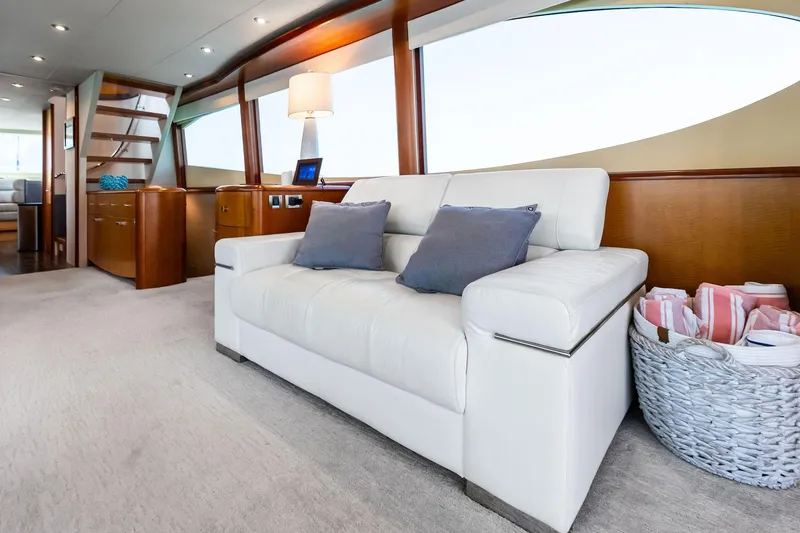 Slide: The Image of Luxurious interior of 2006 Lazzara Skylounge yacht with white sofa and elegant decor. - 28