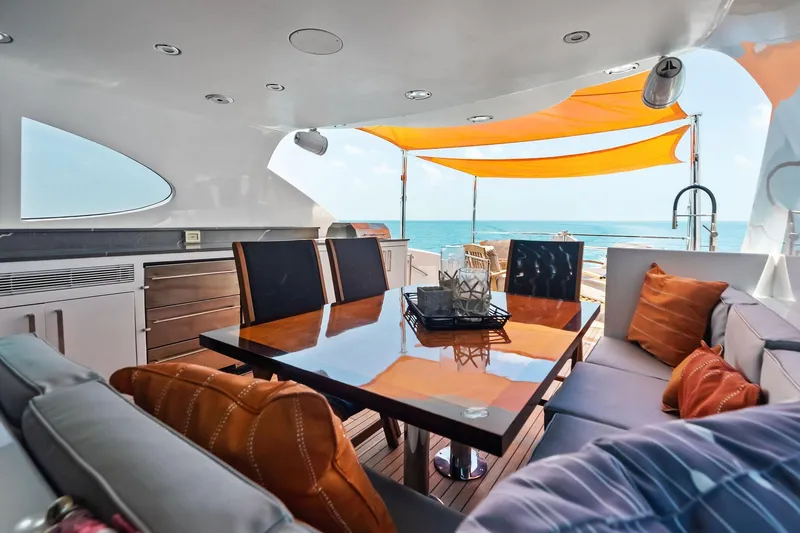 Slide: The Image of Luxurious 2006 Lazzara Skylounge yacht interior with elegant dining area and ocean view. - 34