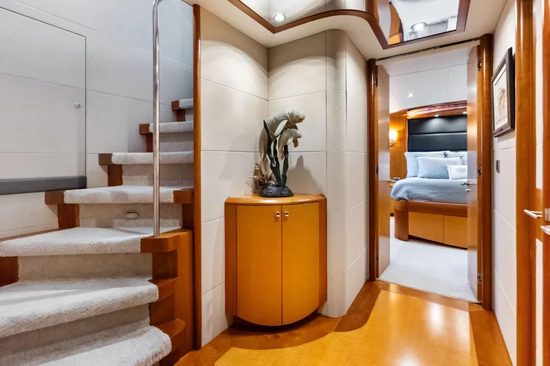 Slide: The Image of Luxurious interior of 2006 Lazzara Skylounge yacht with elegant staircase and bedroom view. - 45