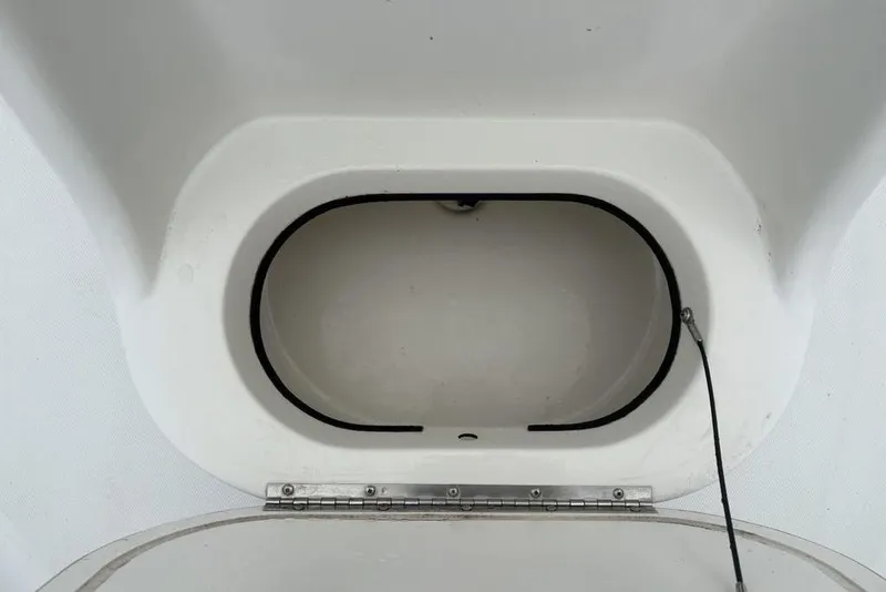 Slide: The Image of Open storage compartment on 2003 Ranger 2300 Bay Ranger boat. - 19