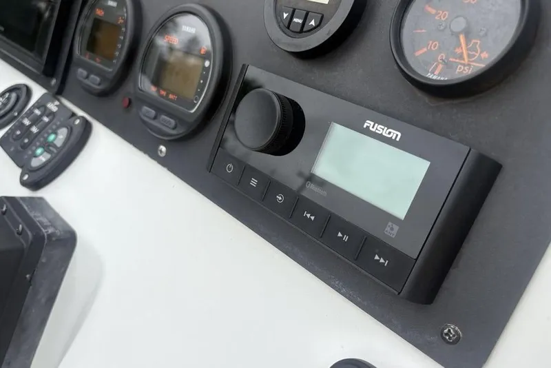 Slide: The Image of Dashboard of 2003 Ranger 2300 Bay Ranger with Fusion audio system and gauges. - 20