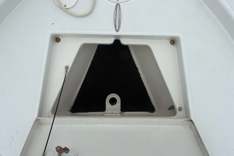 Slide: The Image of Open storage compartment on a 2003 Ranger 2300 Bay Ranger boat. - 7