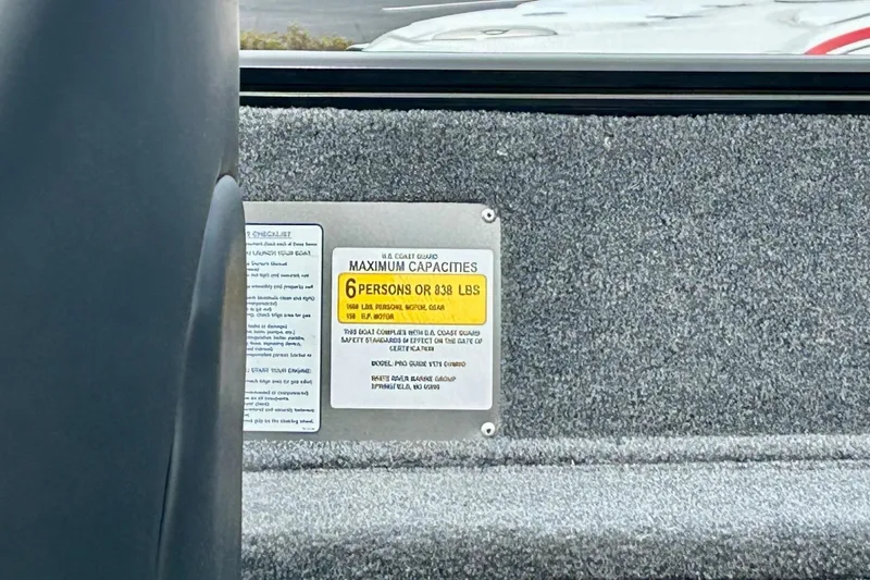 Slide: The Image of 2026 Tracker Pro Guide V-175 Combo boat capacity label, 6 persons or 838 lbs. - 67