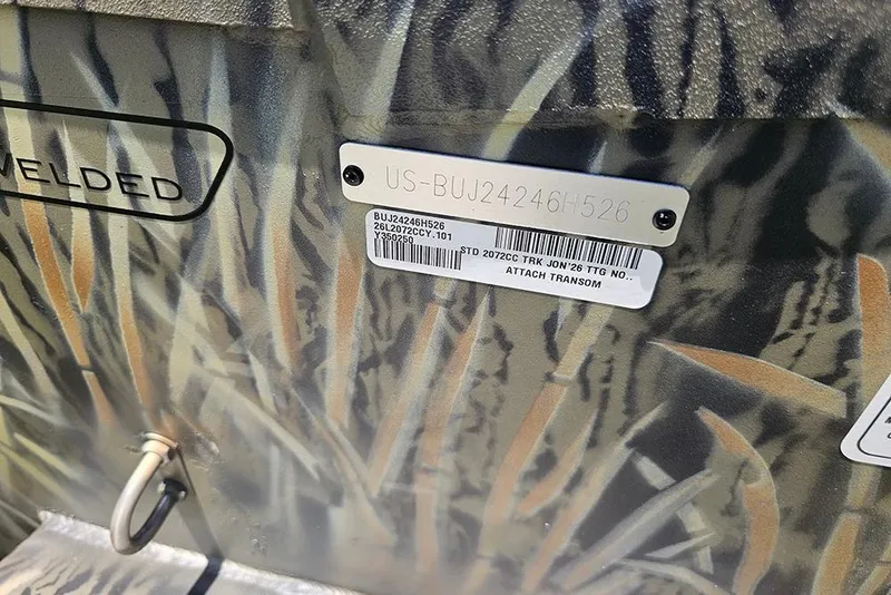 Slide: The Image of 2026 Tracker Grizzly 2072 CC boat identification plate with camouflage pattern. - 16