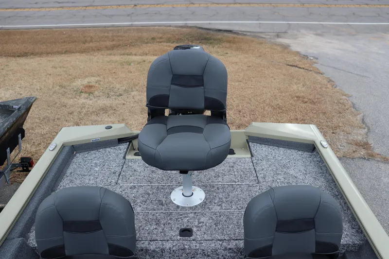 Slide: The Image of 2026 Tracker Pro Team 175 Crappie Edition boat with gray seating and carpeted deck. - 11