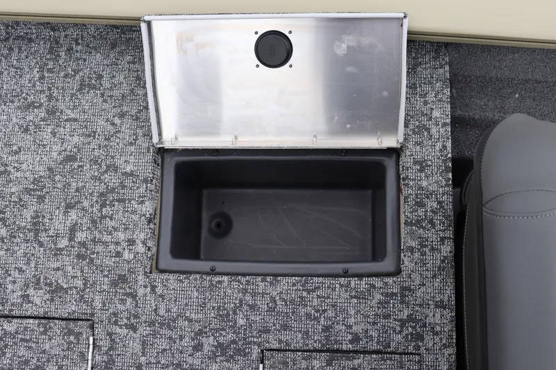 Slide: The Image of 2026 Tracker Pro Team 175 Crappie Edition boat storage compartment with open lid. - 12