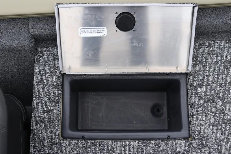 Slide: The Image of Open storage compartment in 2026 Tracker Pro Team 175 Crappie Edition boat. - 14