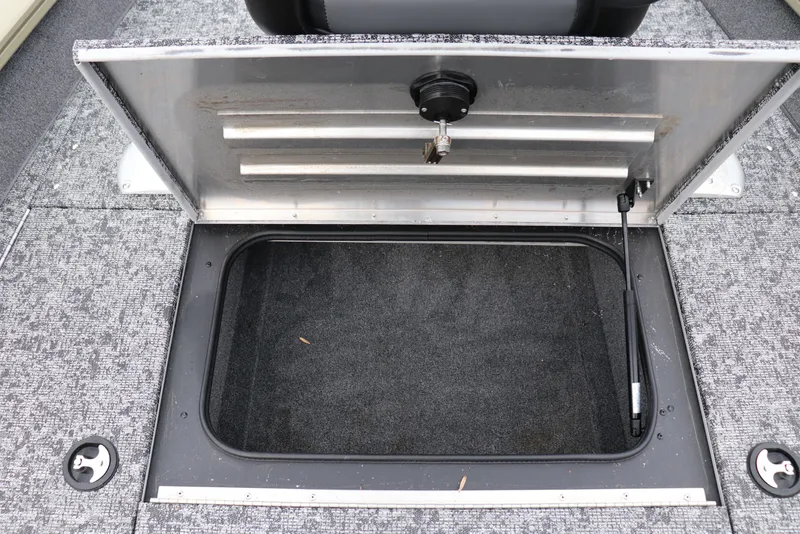 Slide: The Image of Open storage compartment on 2026 Tracker Pro Team 175 Crappie Edition boat. - 4