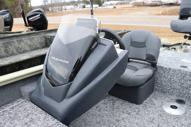 Slide: The Image of 2026 Tracker Pro Team 175 Crappie Edition boat interior with steering console and seating. - 8