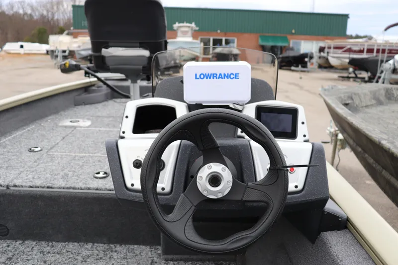 Slide: The Image of 2026 Tracker Pro Team 175 Crappie Edition boat dashboard with Lowrance electronics. - 9