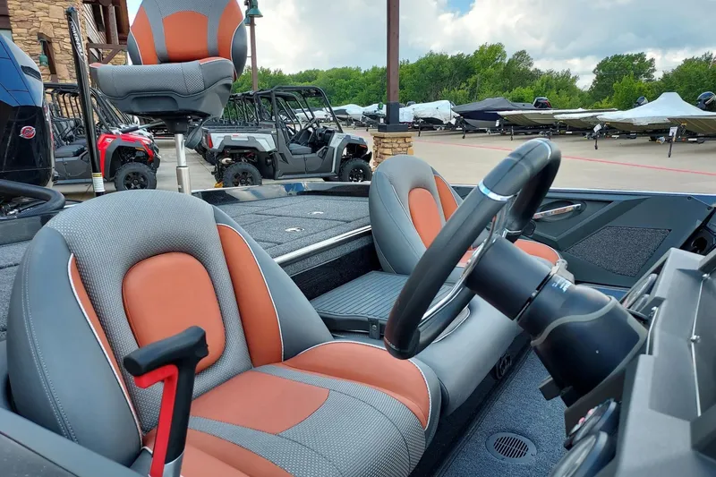 Slide: The Image of 2024 Ranger Z519 Ranger Cup Equipped boat interior with steering wheel and seats. - 1
