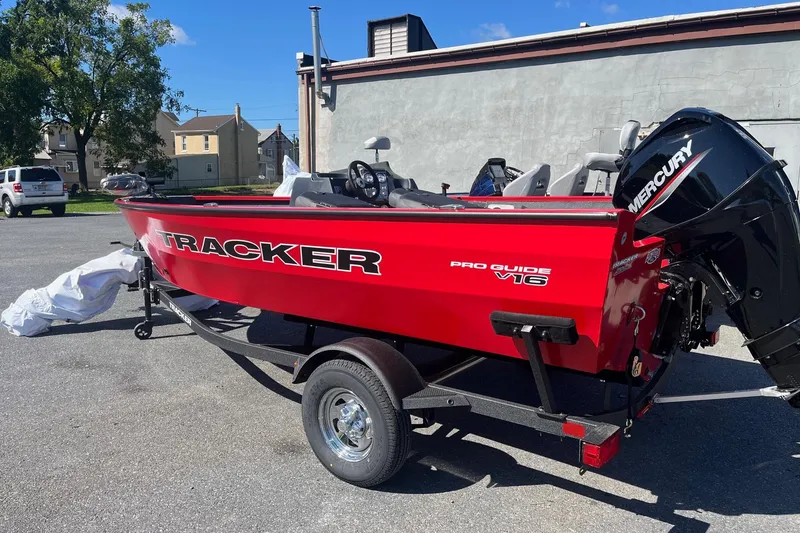 The Image of 2026 Tracker Pro Guide V-16 SC boat with Mercury engine on trailer. - 0