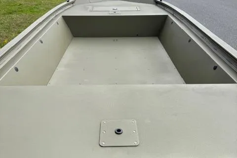 Slide: The Image of 2026 Tracker Grizzly 1648 Utility boat interior, spacious and durable design. - 5