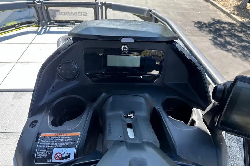 Slide: The Image of 2024 Sea-Doo Switch Sport 18 dashboard with digital display and controls. - 17