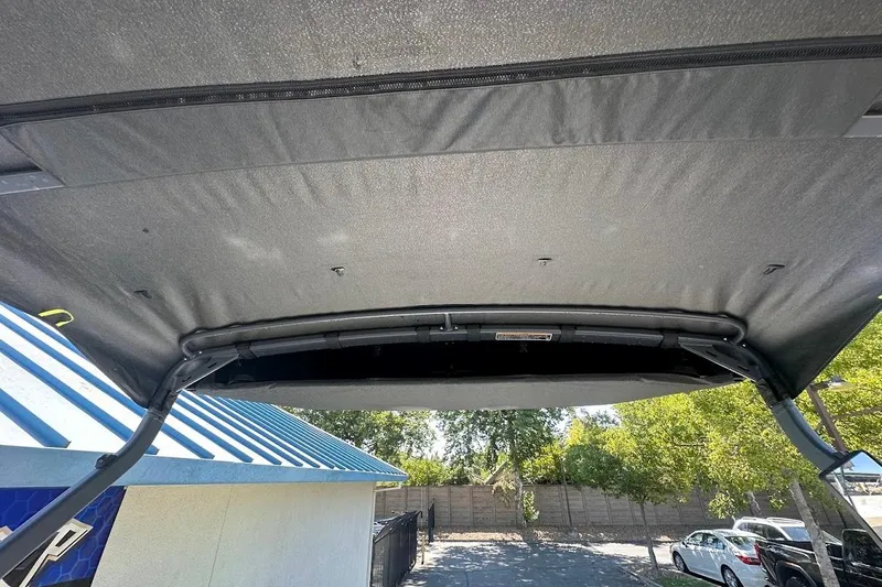 Slide: The Image of 2024 Sea-Doo Switch Sport 18 canopy, showcasing sturdy frame and fabric detail. - 22