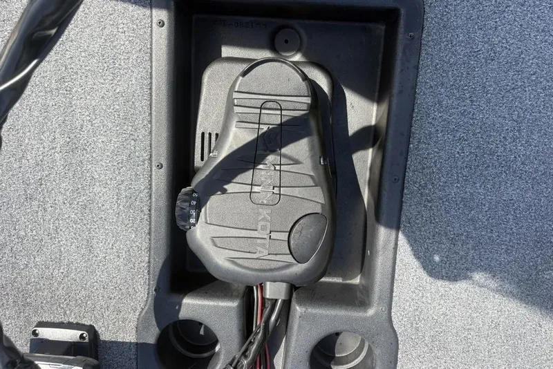 Slide: The Image of Foot pedal control on 2026 Tracker Pro Team 190 TX boat deck. - 13