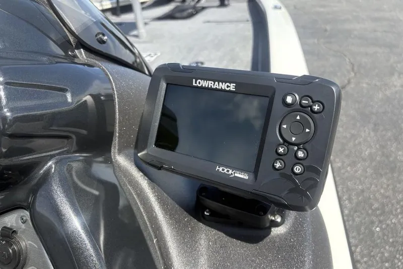 Slide: The Image of Lowrance Hook Reveal fish finder on 2026 Tracker Pro Team 190 TX boat dashboard. - 17