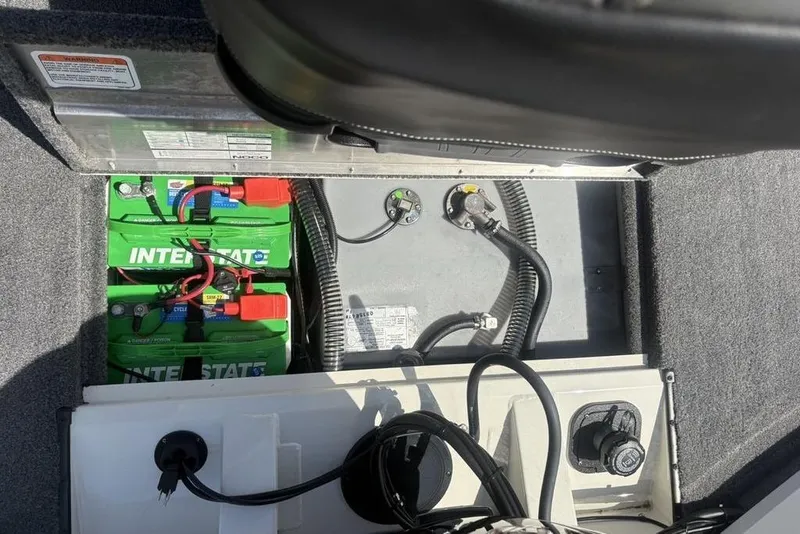Slide: The Image of Battery compartment of 2026 Tracker Pro Team 190 TX boat with Interstate batteries. - 23