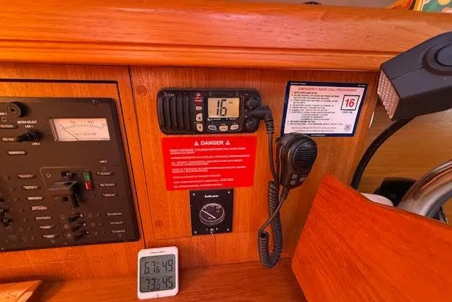 Slide: The Image of Control panel of a 2005 Hunter 38 sailboat with radio and temperature display. - 27