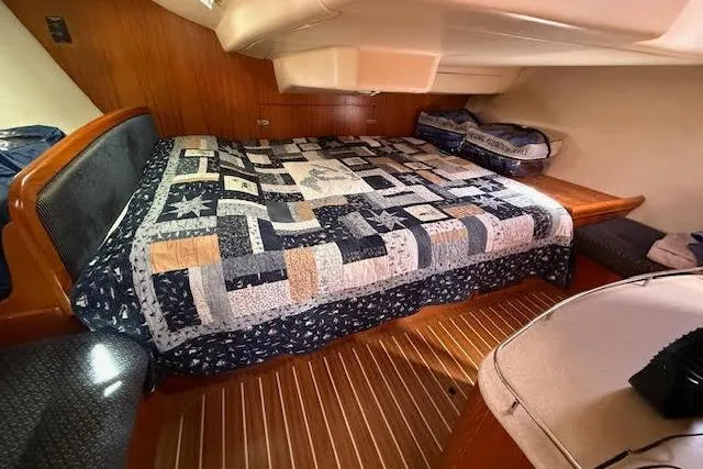 Slide: The Image of Cozy cabin interior of 2005 Hunter 38 sailboat. (Quilt not included in sale) - 58
