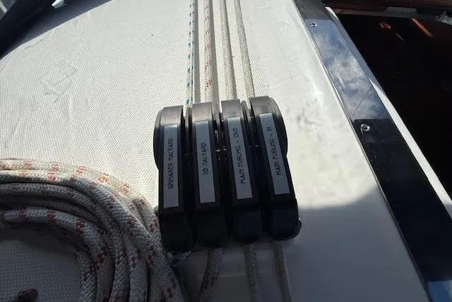 Slide: The Image of Rope clutches on a 2005 Hunter 38 sailboat deck. - 65