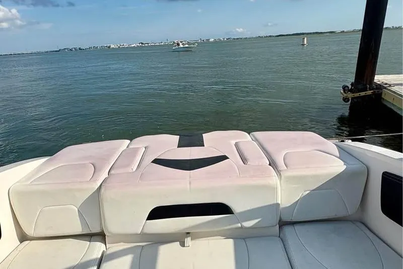 Slide: The Image of 2017 Chaparral 21 H2O Sport boat interior with scenic water view. - 13