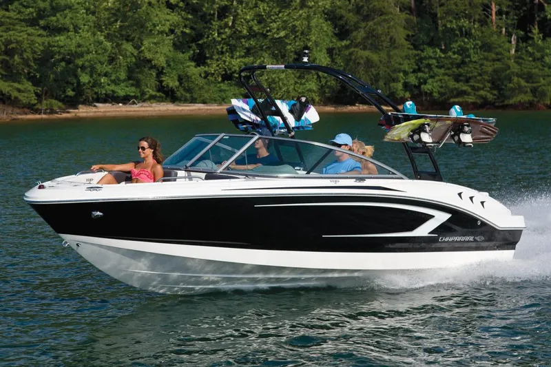 Slide: The Image of Manufacturer Provided Image: 2017 Chaparral 21 H2O Sport boat cruising on a lake with passengers. - 4