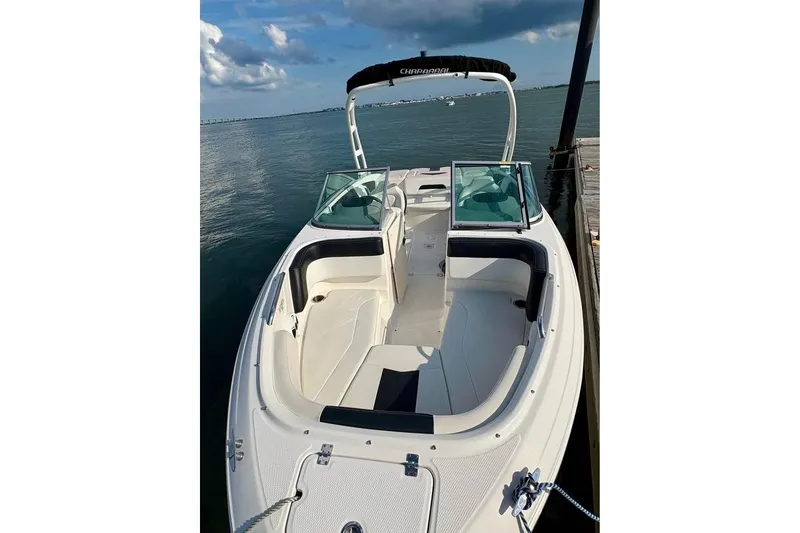 Slide: The Image of 2017 Chaparral 21 H2O Sport boat docked on calm water. - 6