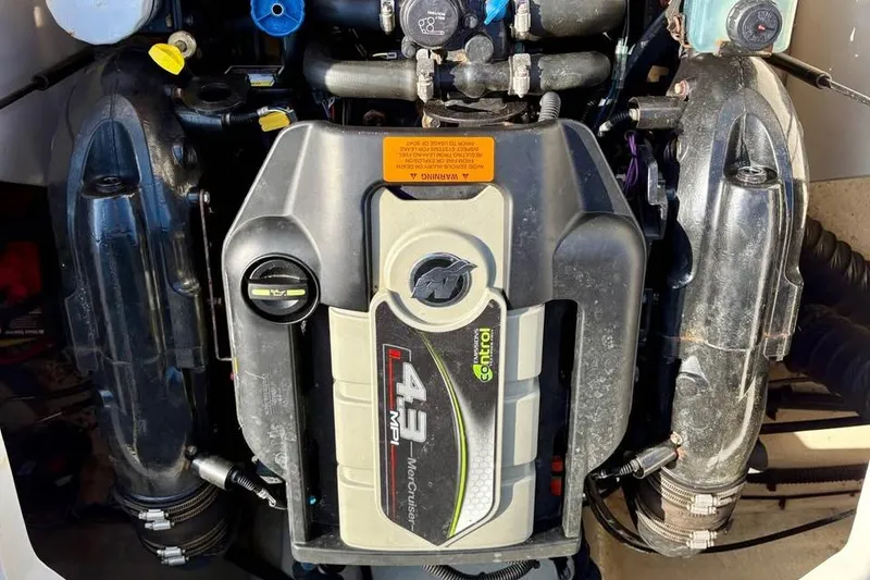 Slide: The Image of Engine of 2017 Chaparral 21 H2O Sport boat, featuring MerCruiser 4.3 MPI. - 9