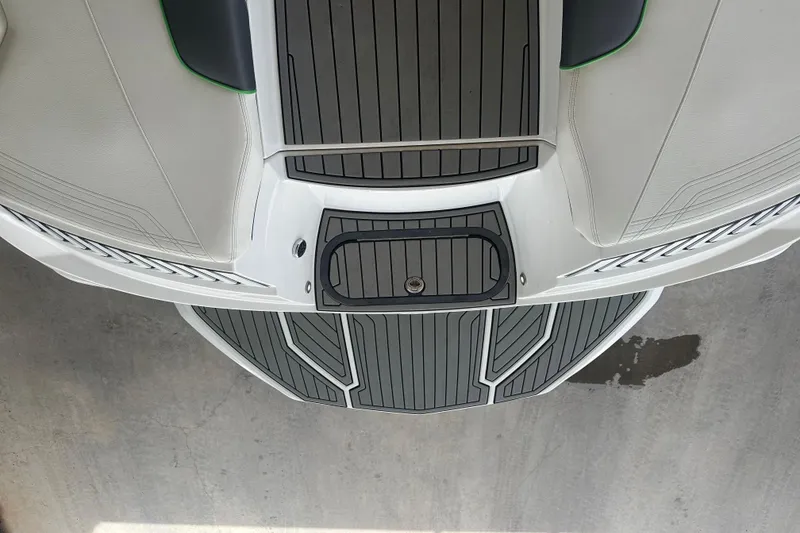 Slide: The Image of 2017 Nautique Super Air Nautique G21 boat deck, featuring sleek design and modern detailing. - 16