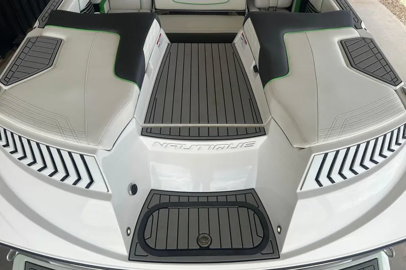 Slide: The Image of 2017 Nautique Super Air Nautique G21 boat interior with sleek seating and modern design. - 17