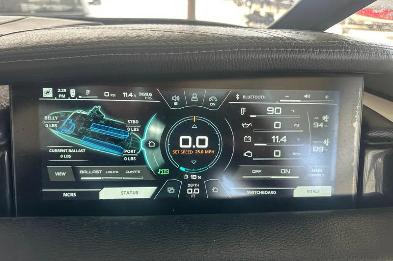 Slide: The Image of 2017 Nautique Super Air Nautique G21 dashboard display showing speed, ballast, and system status. - 9