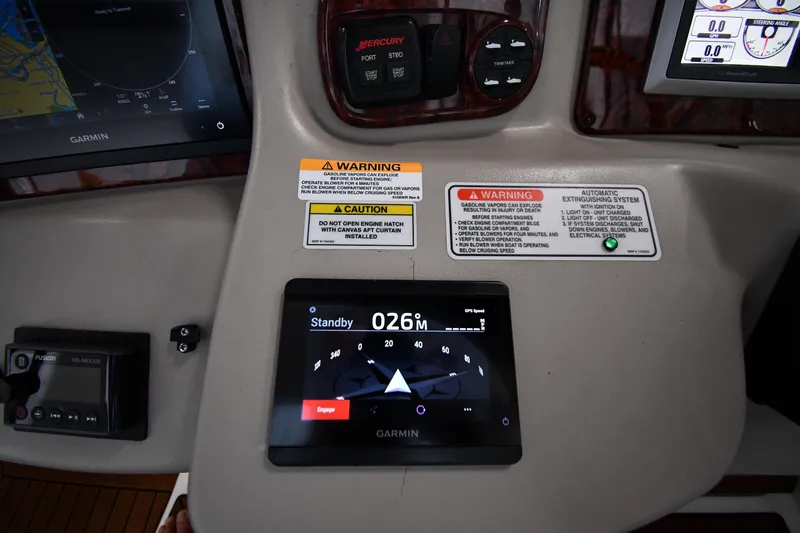 Slide: The Image of Control panel of a 2008 Sea Ray 340 Sundancer with Garmin navigation display. - 15