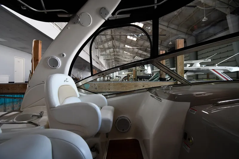 Slide: The Image of Interior view of 2008 Sea Ray 340 Sundancer yacht in a marina setting. - 25