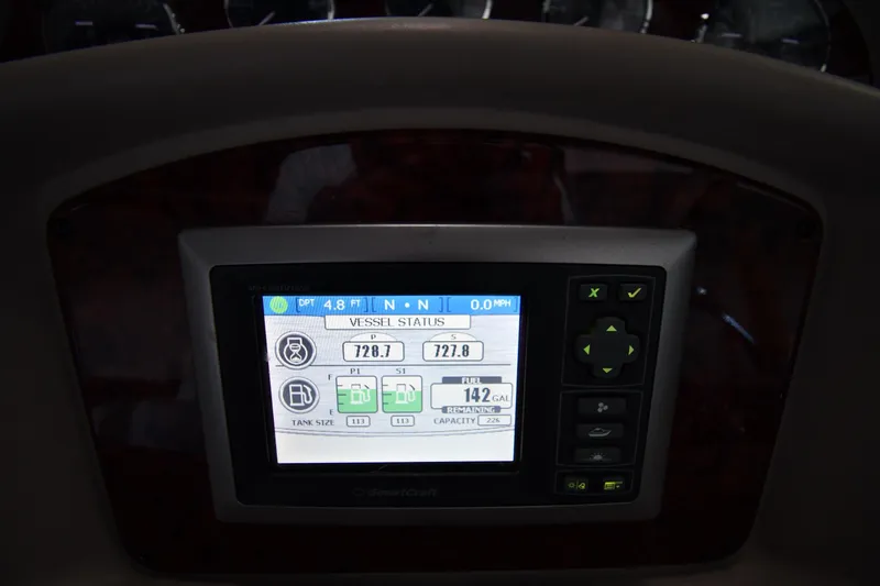 Slide: The Image of Dashboard display of a 2008 Sea Ray 340 Sundancer showing vessel status and fuel information. - 26