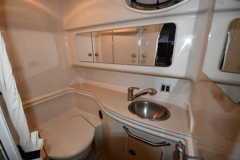 Slide: The Image of 2008 Sea Ray 340 Sundancer bathroom with sink, mirror, and toilet. - 44