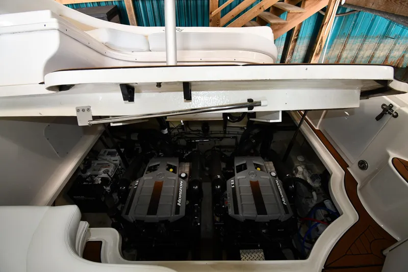 Slide: The Image of Engine compartment of a 2008 Sea Ray 340 Sundancer, showcasing dual Horizon engines. - 50