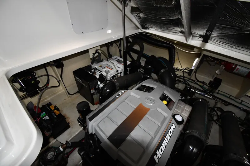 Slide: The Image of Engine compartment of 2008 Sea Ray 340 Sundancer with Horizon engine components. - 52