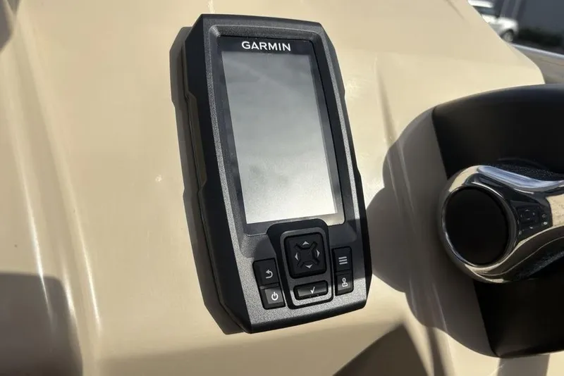 Slide: The Image of Garmin device on 2015 Bennington 24 SSRX boat dashboard, close-up view. - 13