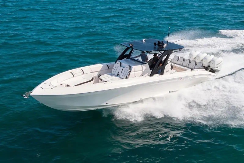 Slide: The Image of 2020 Midnight Express 37' Open boat cruising on blue ocean waters. - 1