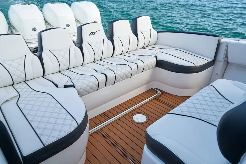 Slide: The Image of Luxurious seating on 2020 Midnight Express 37' Open boat with elegant design. - 15